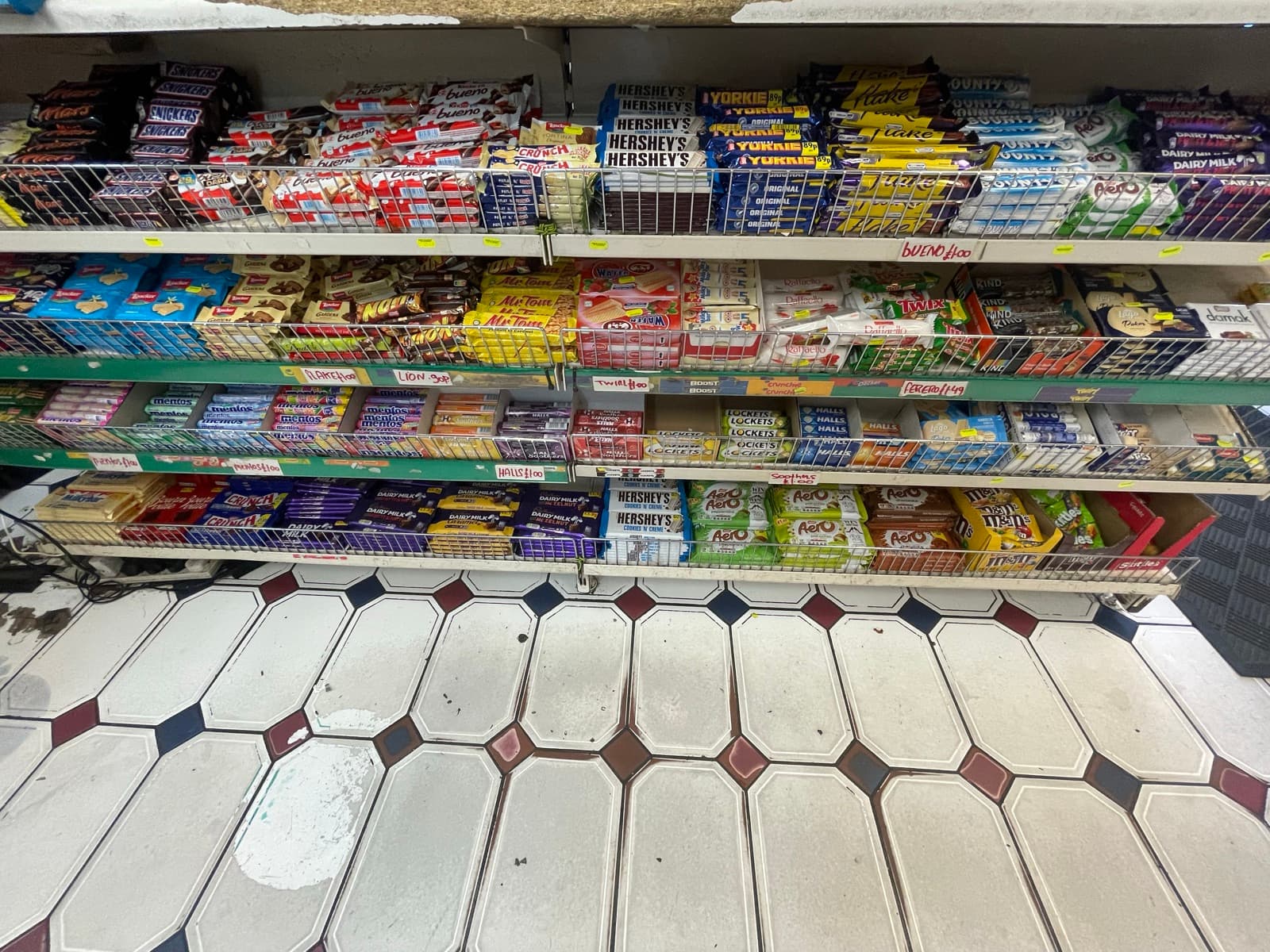 Shelves of chocolate bars and boxed sweets