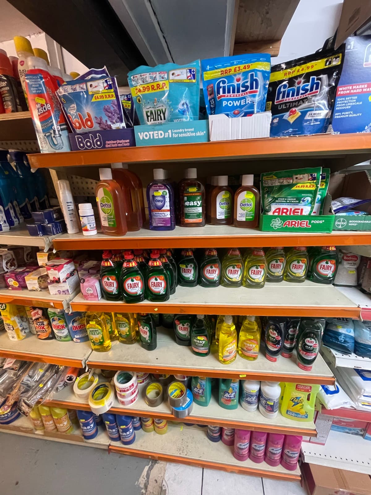 Shelves of laundry detergent and cleaning products