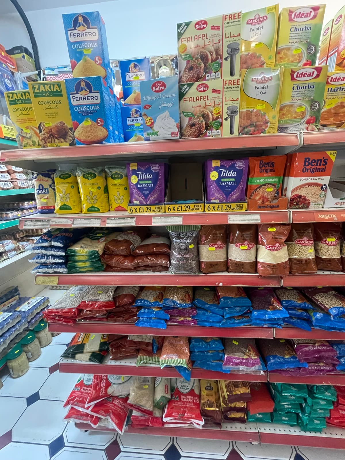 Shelves stacked with sacks of rice and grains