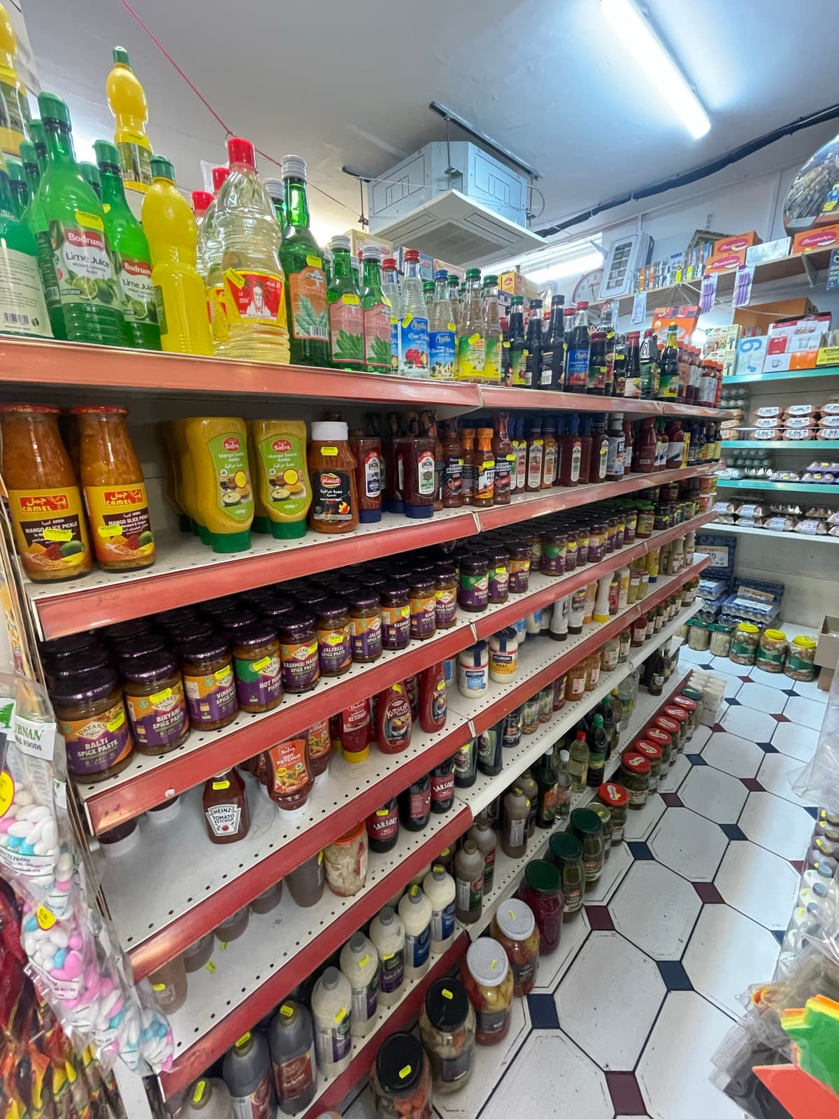 Shelves of jarred sauces and condiments