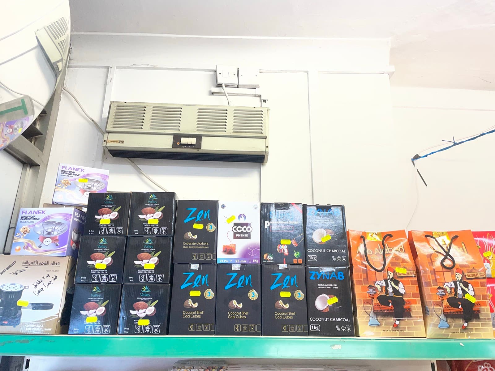 Cigarettes, Vapes & Shisha on the shelves at Alhayat, 85–87 Lupus Street, Pimlico (photo 7)